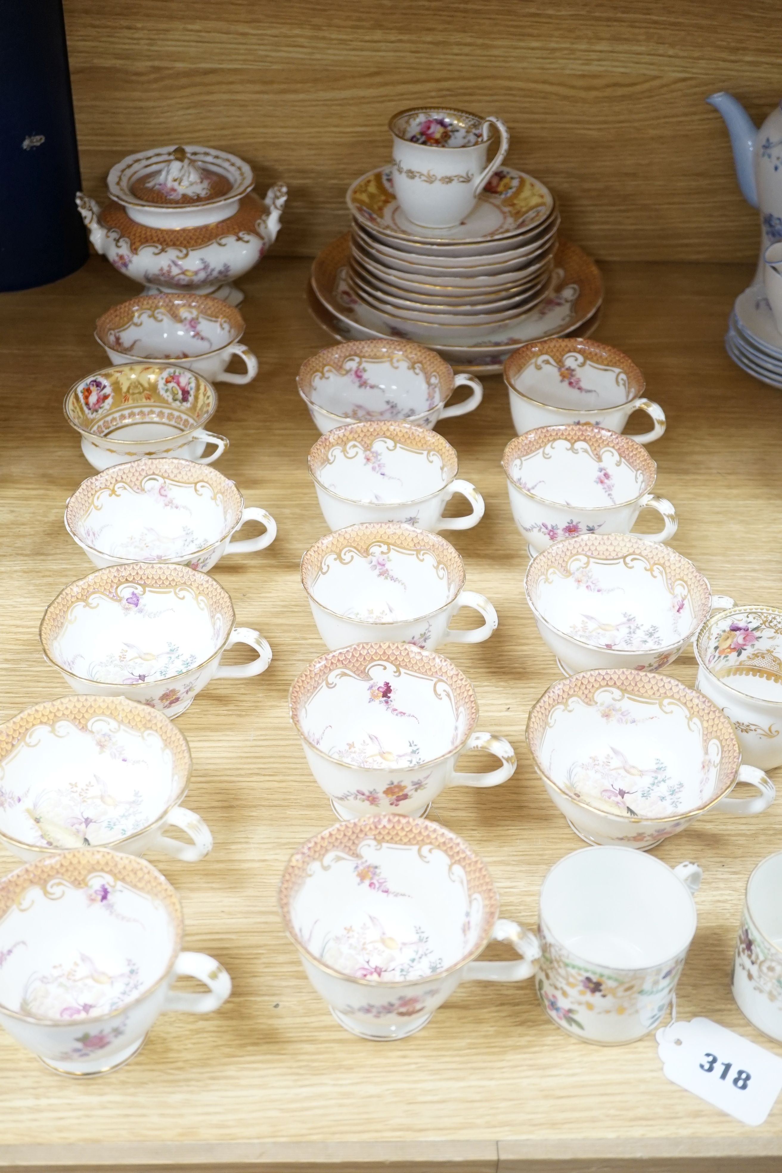 A Victorian porcelain tea service and two coffee cans